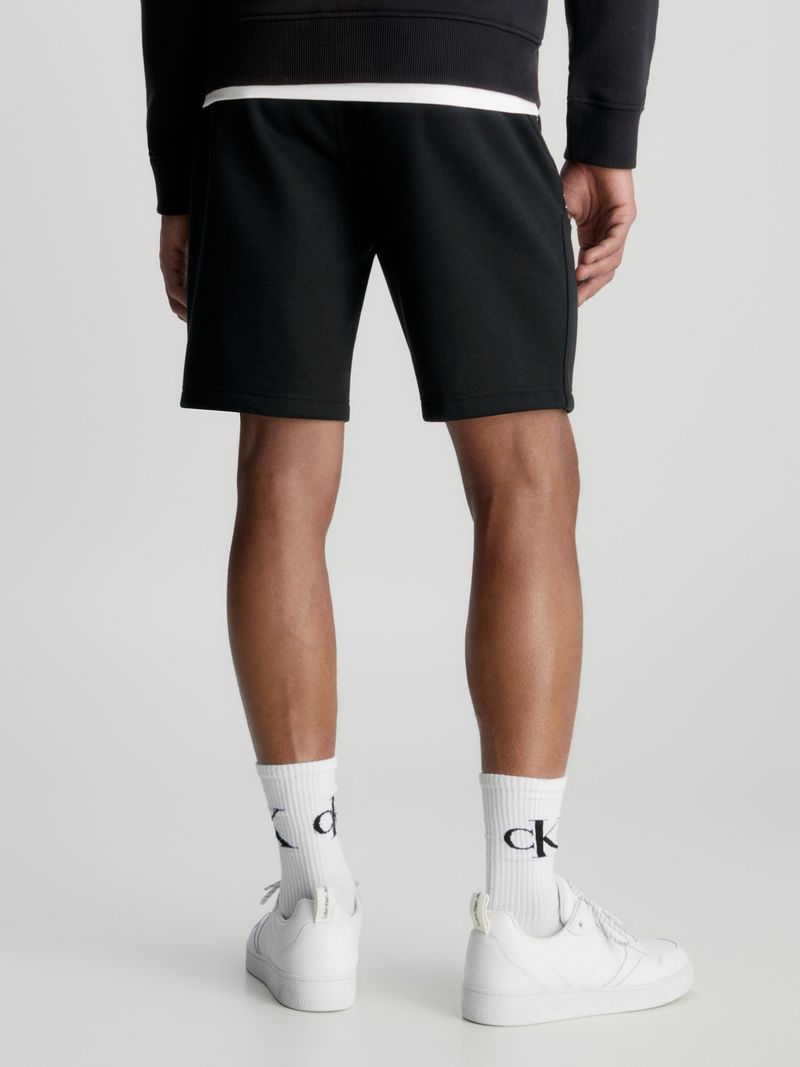 SHORTS-DE-CHANDAL-CON-LOGO-TAPE
