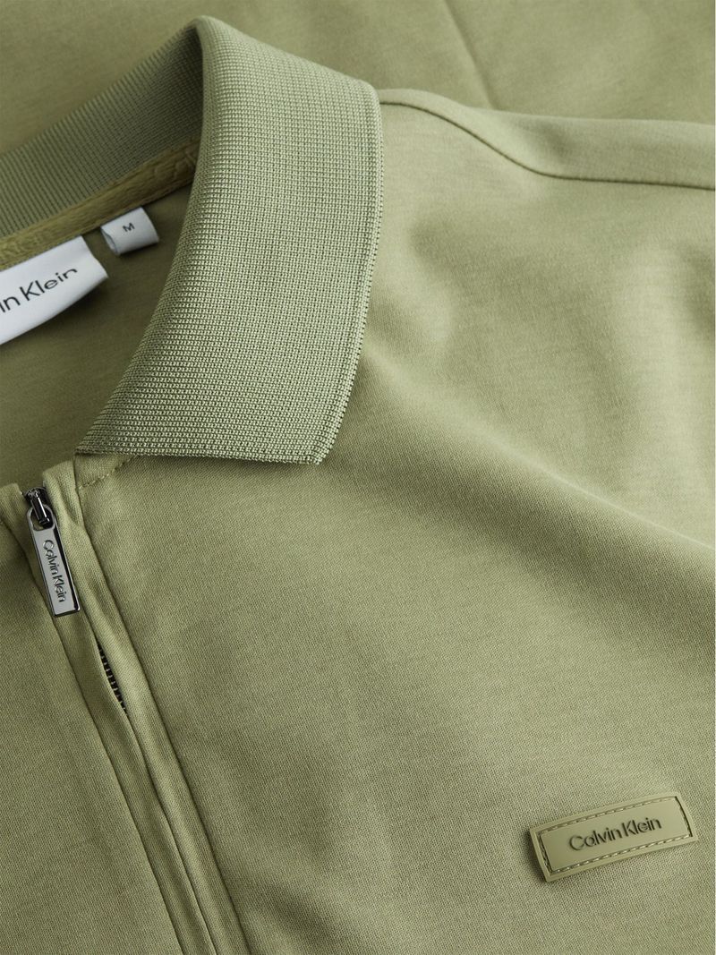 Polo-de-algodon-con-media-zipper